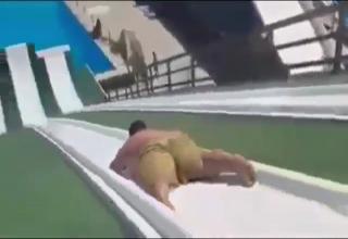 fat dude on waterslide
