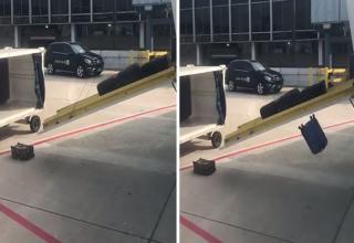 The Internet was not pleased when a clip of this guys bag flying out the airplane went viral. 