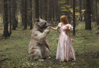 Katerina Plotnikova is a Moscow-based photographer that captures incredible photos of people with real animals. The colors and scenery make most of these look like something out of a fairytale.