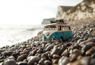 photographer Kim Leuenberger loves to travel and take pictures of vintage toy cars placed in different city and landscapes, creating amusing little artworks that imagine a miniature world.

Using mini versions of motoring classics – including everything from the VW Beetle and Camper to the original Mini Cooper – she finds beautiful scenery to
