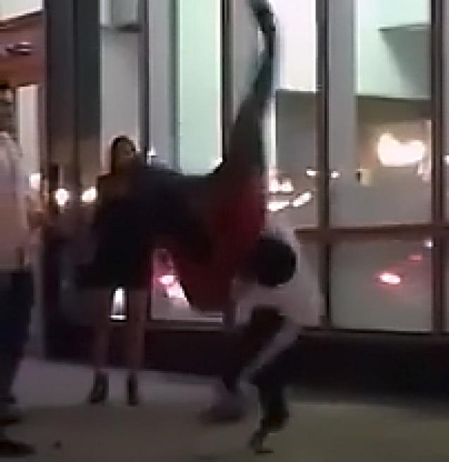 Little Guy In a Street Fight Against Gigantic Opponent In Street Of USA