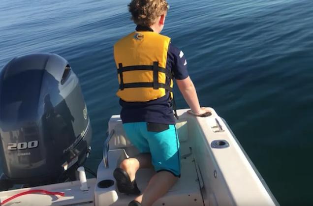 Father and Son Watch 20 Foot Great White Circle Their Boat