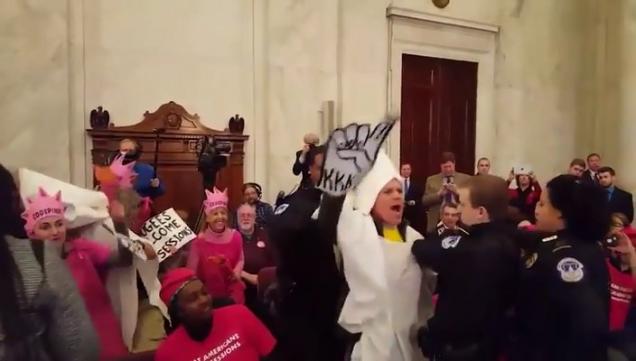 Two Idiots Show Up To Meeting In KKK Outfits To Protest Trump