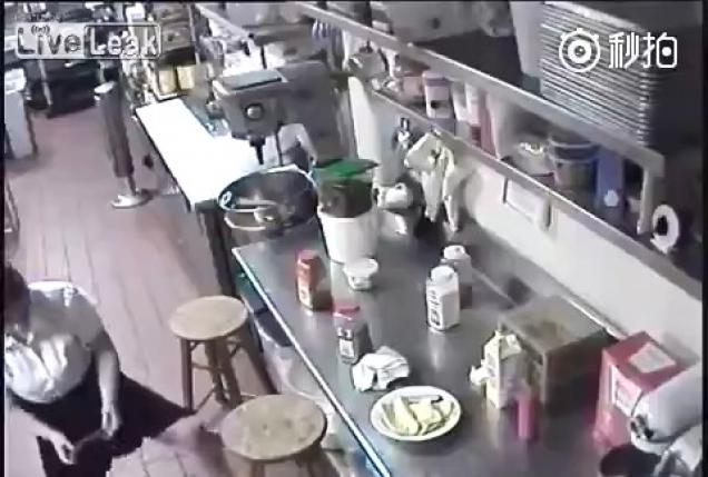 Waitress puts her flavor on sausage dish then serves it to customer