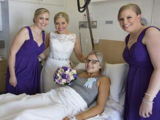 A bridesmaid went into labor early, so the bride brought the wedding to her
