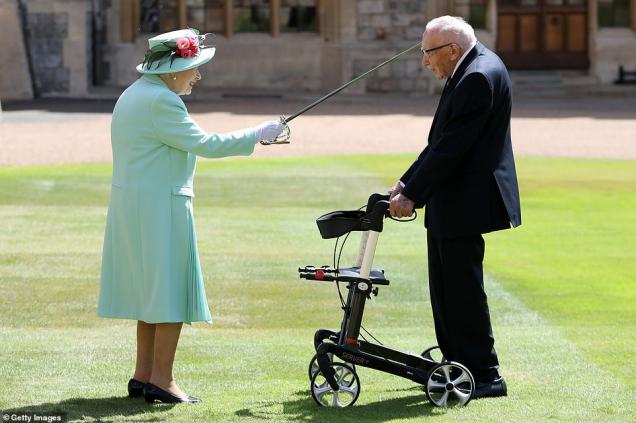 'If I kneel down I'll never get up again, Ma'am': Captain Sir Tom Moore shares joke with the Queen as she knights at Windsor Cas