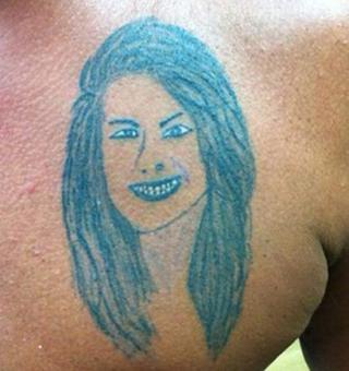 21 Awkward Tattoos That Need Explaining
