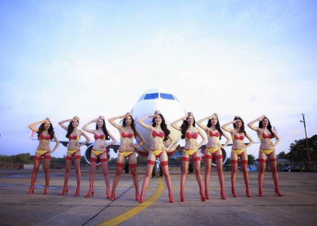 Sometimes Vietnamese Airline Company's Flight Attendants Slip Into Bikinis To Put On A Show