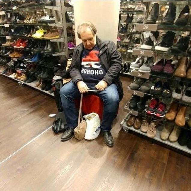 20 Funny Pics Of Miserable Men Caught Shopping With Their Wives