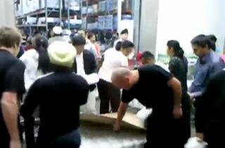 Canadian-East Indians murder a pallet of milk.