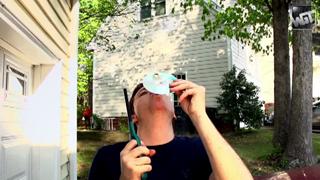 Cool CD Trick in Slow Motion (Blowing Bubble)