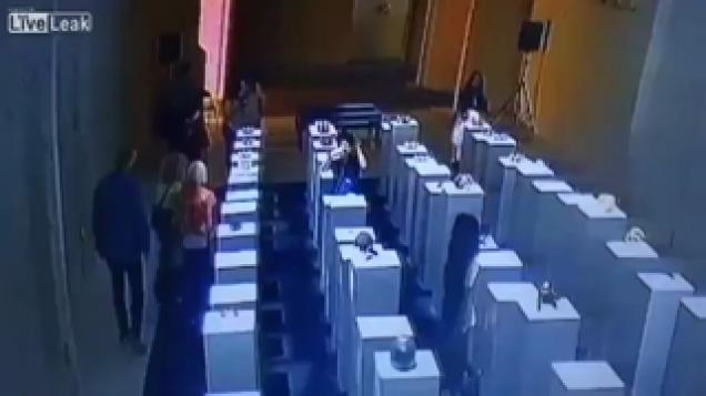 Woman accidentally destroys $200,000 worth of artwork while taking selfie at art exhibit