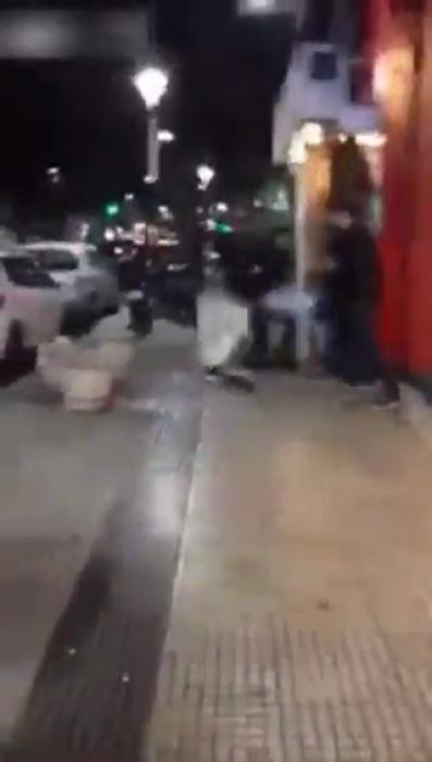 Dude gets hit with a big stick in the head