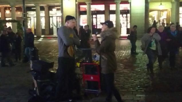 Celinde Schoenmaker duets with busker Stephen Barry in Covent Garden London
