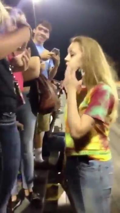Girl owned at high school football game