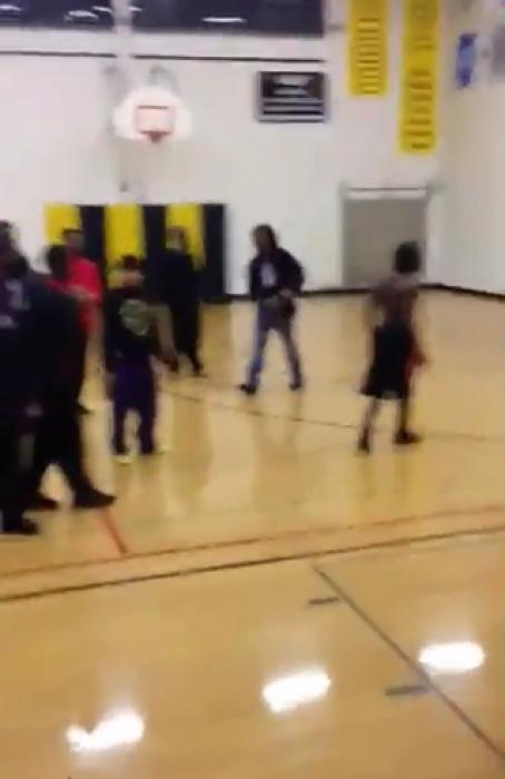 Guy Gets Bashed In The Face With a Steel Chair After Basketball Game