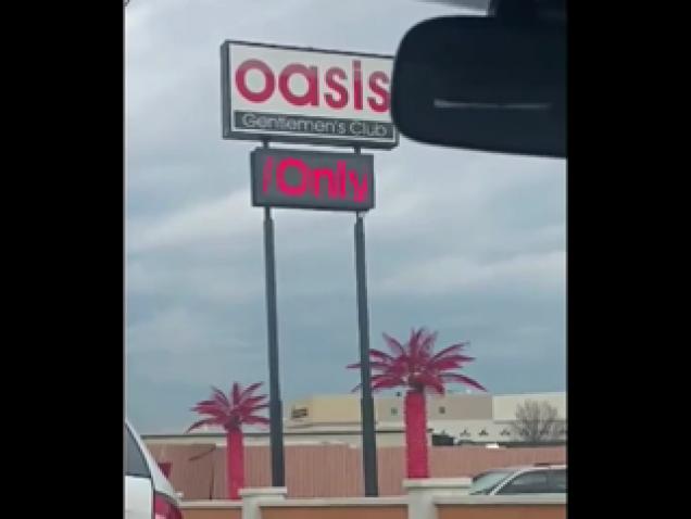 Guy Records Hilarious Strip Club Billboard Message
