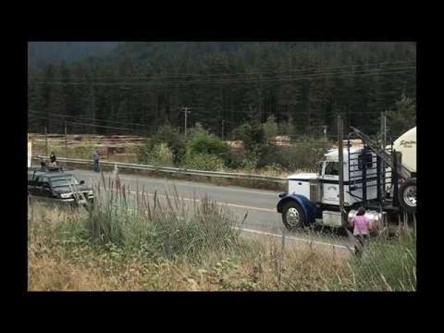 Log Truck Driver Blows Through Protestors Banner Ftw Video Ebaums World 