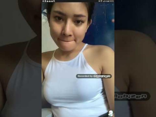 beautiful girl showing off breasts