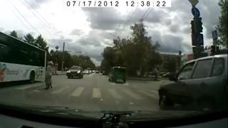 Driver Stops, Helps Old Lady Cross The Street