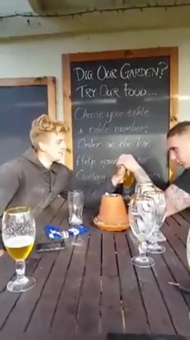 Guy Gets Pranked By His Pub Mates With Strength Test Facepalm Video