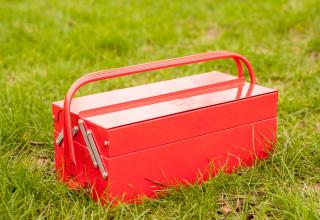 Complete with storage racks, warming trays and the classic red toolbox look.