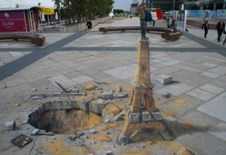 Artist Julian Beever creates these drawings that seem to pop out when viewed from a certain angle.