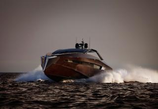 Hedonist embodies the very soul of Art of Kinetik. Combining levels of refinement and comfort with daring looks and matchless performance, this 63 foot yacht epitomizes the genre. Its solid mahogany hull and Rolls Royce water jets combine to deliver an unusually smooth ride even at the top speed of 40 knots. Naturally, aesthetics is in every detail