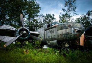 Scrapyard worker Walter Soplata bought up about 50 engines and 30 aircraft from World War II and his them in Newbury, Ohio. Could you imagine walking through the woods and seeing this?