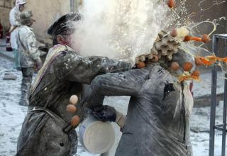 Each year on December 28 in Lbi, a Spanish town there is interesting battle organised - battle of flour and eggs. People throw flour and eggs at each other. Its really amazing to here and even more to watch so check out the madness photos collection
