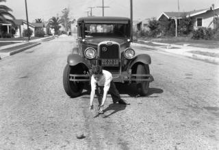 This series of photographs by the Automobile Club of Southern California attempts to demonstrate the danger which children playing in streets pose to drivers and to remind them to stay alert when behind the wheel....