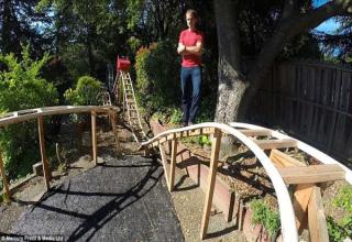 Only a cool dad builds a roller coaster in his back yard.  I'm Jealous..