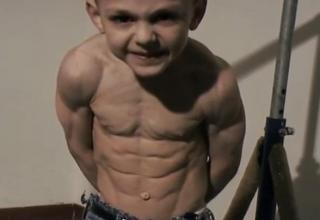 Giuliano Straw is a 5 year old boy from Romania that is currently listed in the Guinness Book of Records as the strongest boy in the world.  Looks like this kid could kick your kids ass.