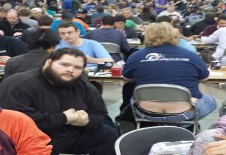 He wanted to document the biggest Magic event in the USA, so he started posing around the players while revealing an important part of the Magic tournaments, the ass cracks.