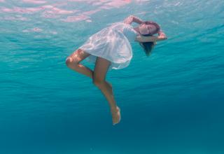 If mermaids actually existed, this beautiful young woman would definitely be one. Bahamas native Sacha Kalis is so connected to the ocean, she learned to swim before she could even walk. Since then, she's spent as much of her life underwater as humanly possible.
