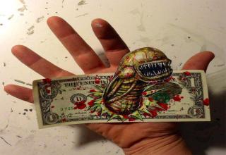 It's illegal to deface currency, however that doesn't stop artists like <a href="http://donovanclark.blogspot.com/" target="_blank">Donovan Clark</a> from taking currency to a whole new creative level.