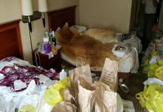 This is what the hotel owners found after she was confronted about the smell coming out of her room.