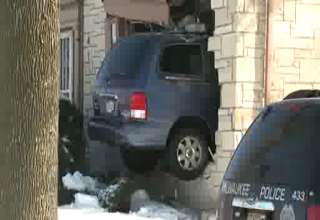 Curb Jumping Van Crashes Into House