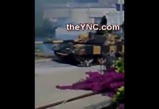 graphic images of a person who was ran over by a military tank