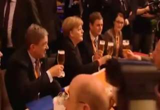 German Chancellor Angela Merkel Eats 6 Beers From Clumsy Waiter