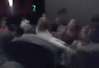 Woman Starts Fight in Movie Theater